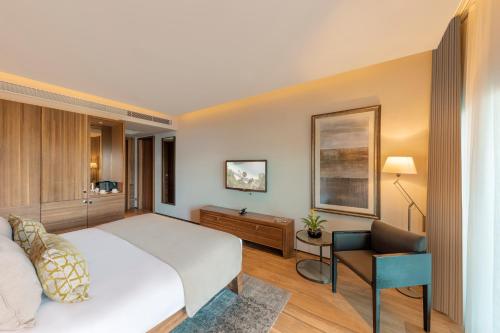 Ένα ή περισσότερα κρεβάτια σε δωμάτιο στο D Maris Bay
