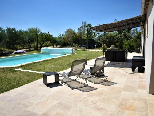 The swimming pool at or close to Holiday Home L'Oliveraie by Interhome