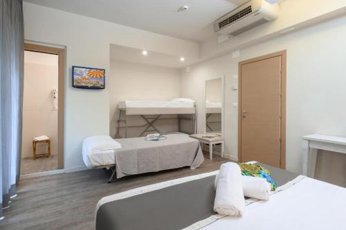 Postel nebo postele na pokoji v ubytování Atlas Hotel