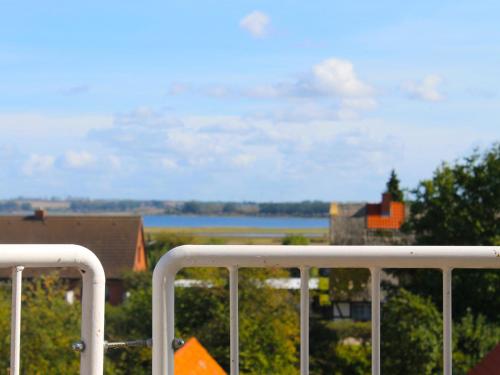 a view of the water from a balcony of a building at Apartment FIP-Ferienpark - Insel Poel-1 by Interhome in Gollwitz