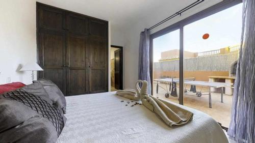 Posteľ alebo postele v izbe v ubytovaní Anju Villas Villas Vistas del Mar