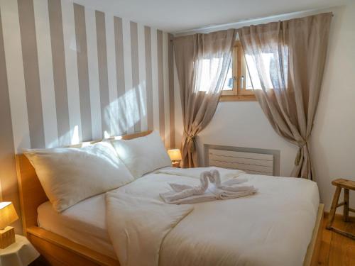 Postel nebo postele na pokoji v ubytování Apartment Chesa Palüdin 5 - Celerina by Interhome