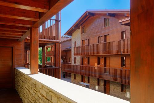 a view of the outside of a building with balconies at Borgo Fantino - Residenze e Alloggi Vacanza in Limone Piemonte