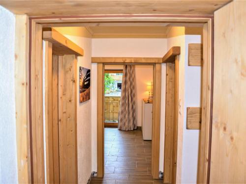 a hallway with a door leading to a kitchen at Apartment Wiesenhof by Interhome in Reith bei Seefeld