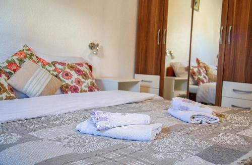 Postel nebo postele na pokoji v ubytování Apartment Ilija