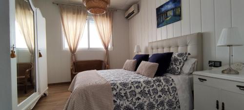 Postel nebo postele na pokoji v ubytování Casa tradicional Torrevieja