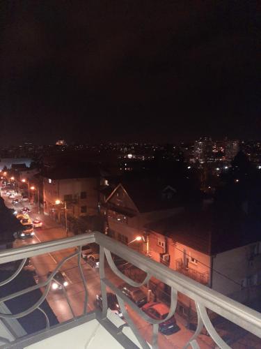 a view of a city at night with street lights at Tanja 3 in Dušanovac (historical)