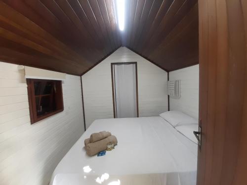 Voodi või voodid majutusasutuse Raio de Sol pousada & camping toas