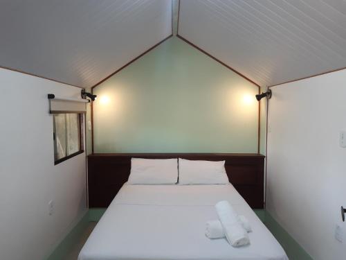 Voodi või voodid majutusasutuse Raio de Sol pousada & camping toas