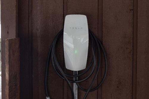 a white computer mouse hooked up to a wall at Waterfront Cabin at White Pass and Mount Rainier National Park in Packwood