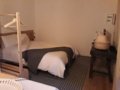 A bed or beds in a room at Casa da Ferreirinha