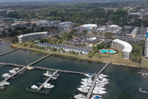 an aerial view of a marina with boats in the water at Pirates Bay Condominiums Unit 302A in Fort Walton Beach