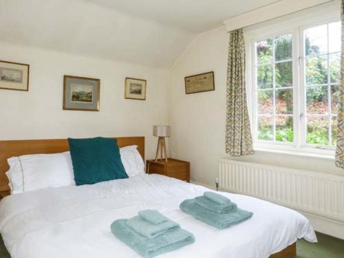 Katil atau katil-katil dalam bilik di Townhead Cottage