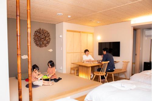 a group of people sitting in a room at so, KANAZAWA in Kanazawa