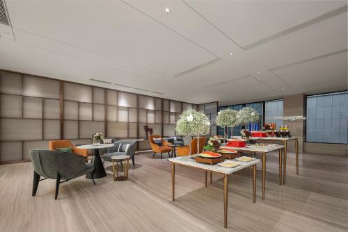 Area soggiorno di Holiday Inn Changchun Jingyue by IHG