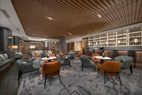 Area soggiorno di Holiday Inn Changchun Jingyue by IHG