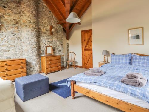 Postel nebo postele na pokoji v ubytování Swallows Cottage