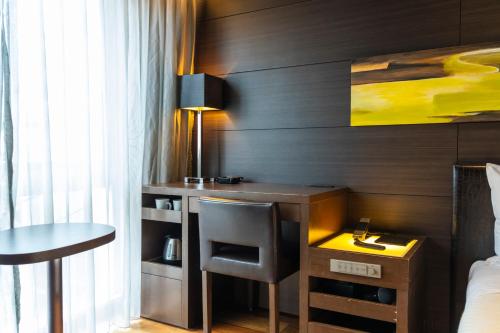 Un ou plusieurs lits dans un hébergement de l'établissement KOKO HOTEL Fukuoka Tenjin