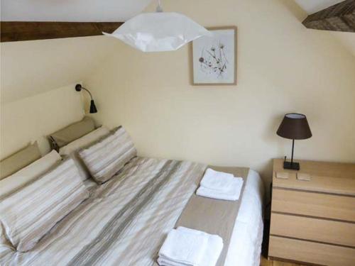Кровать или кровати в номере The Old Cottage