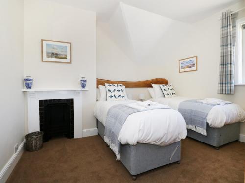 Ένα ή περισσότερα κρεβάτια σε δωμάτιο στο New Park Farm Cottage