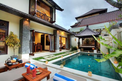 an image of a villa with a swimming pool at Villa Batu Kurung in Ubud