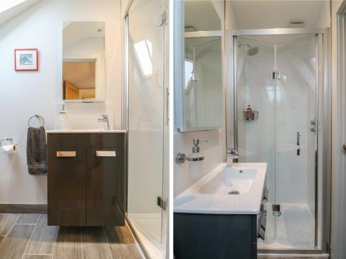 a bathroom with a sink and a shower at Lantern Cottage in Padstow