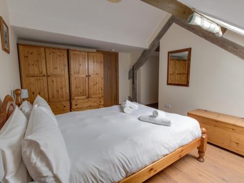 En eller flere senge i et værelse på George's House