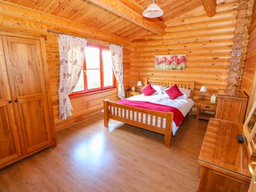 Llit o llits en una habitació de Sycamore Lodge