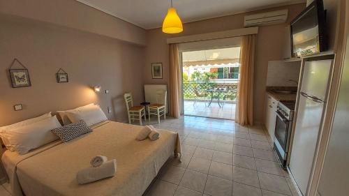 a bedroom with a bed with two hearts on it at K Downtown Lefkada studios & apartments in Lefkada