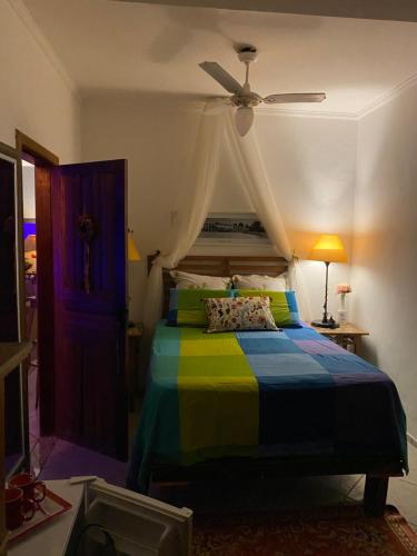 Uma cama ou camas num quarto em LE BOUTIQUE SUÍTES - PRAIA de MARESIAS