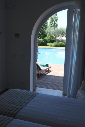 Katil atau katil-katil dalam bilik di Hostalet de Begur - Adults Only