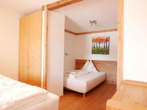 Кровать или кровати в номере Appartements Tauernzauber