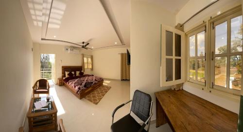 Postel nebo postele na pokoji v ubytování Green Acres Homestay