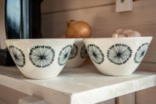 three bowls sitting on a table at Fox House Tisá / Rájec in Tisá