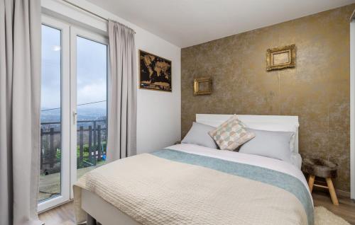 Postel nebo postele na pokoji v ubytování TOTO I LALA