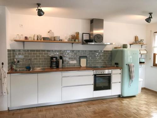 Kuchyň nebo kuchyňský kout v ubytování Ferienwohnung Nonntal