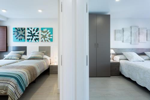 Ένα ή περισσότερα κρεβάτια σε δωμάτιο στο Rincón del Duende