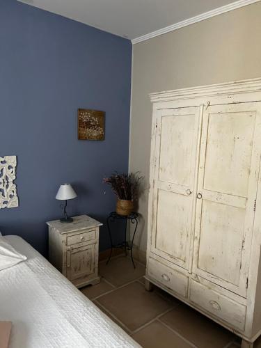 Letto o letti in una camera di Villa QUINISSOLE