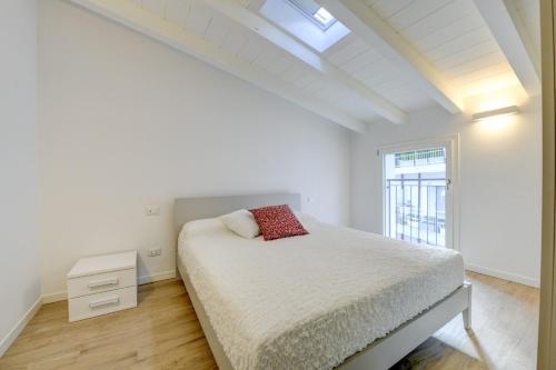 A bed or beds in a room at Maison Bellini number 3