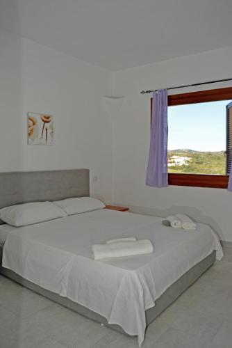 Postel nebo postele na pokoji v ubytování Residence Eolo