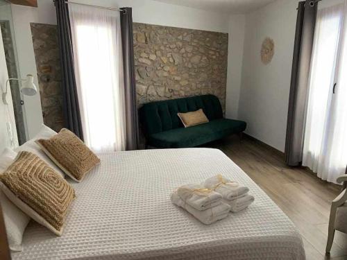 מיטה או מיטות בחדר ב-Casa TERRAE Casco antiguo WifiAA