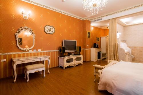 Postel nebo postele na pokoji v ubytování Cingjing Florence Resort Villa