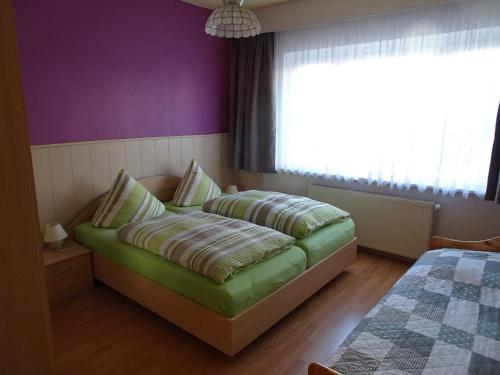 Postel nebo postele na pokoji v ubytování Ferienwohnung Böhnstedt