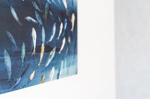 a close up of a painting of feathers at Villa La Pagaia Sorrento Coast in Vico Equense