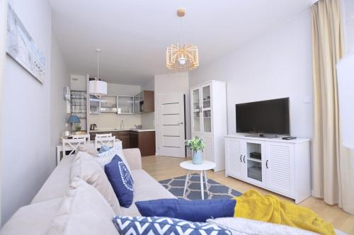 Kuchyňa alebo kuchynka v ubytovaní Victus Apartamenty, Apartament Family&Friends