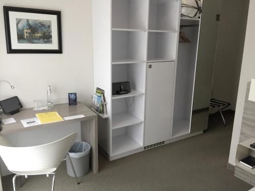 Cuisine ou kitchenette dans l'établissement Hotel Schweizer Hof