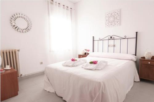 Ліжко або ліжка в номері Hostal San Cristobal - Pontedeume