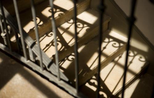 a shadow of a railing on a stair case at Le Montellier in Blacé