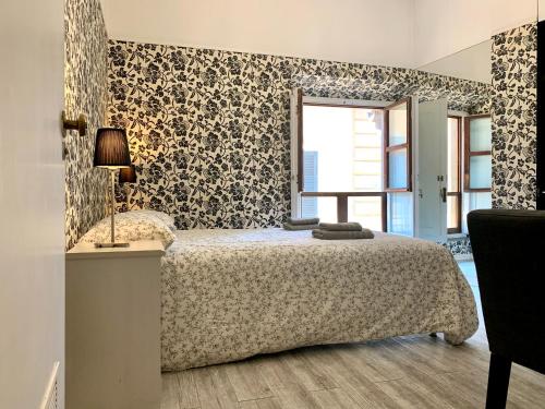Кровать или кровати в номере Duomo apartment with a view