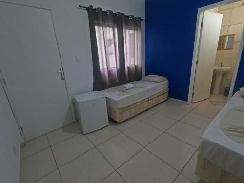 Katil atau katil-katil dalam bilik di Hotel Mão de Fatima